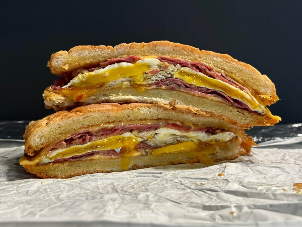 Pastrami, egg, and cheese breakfast sandwich