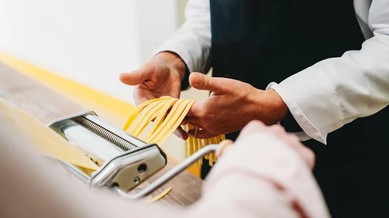 Chef handcrafting fresh pasta
