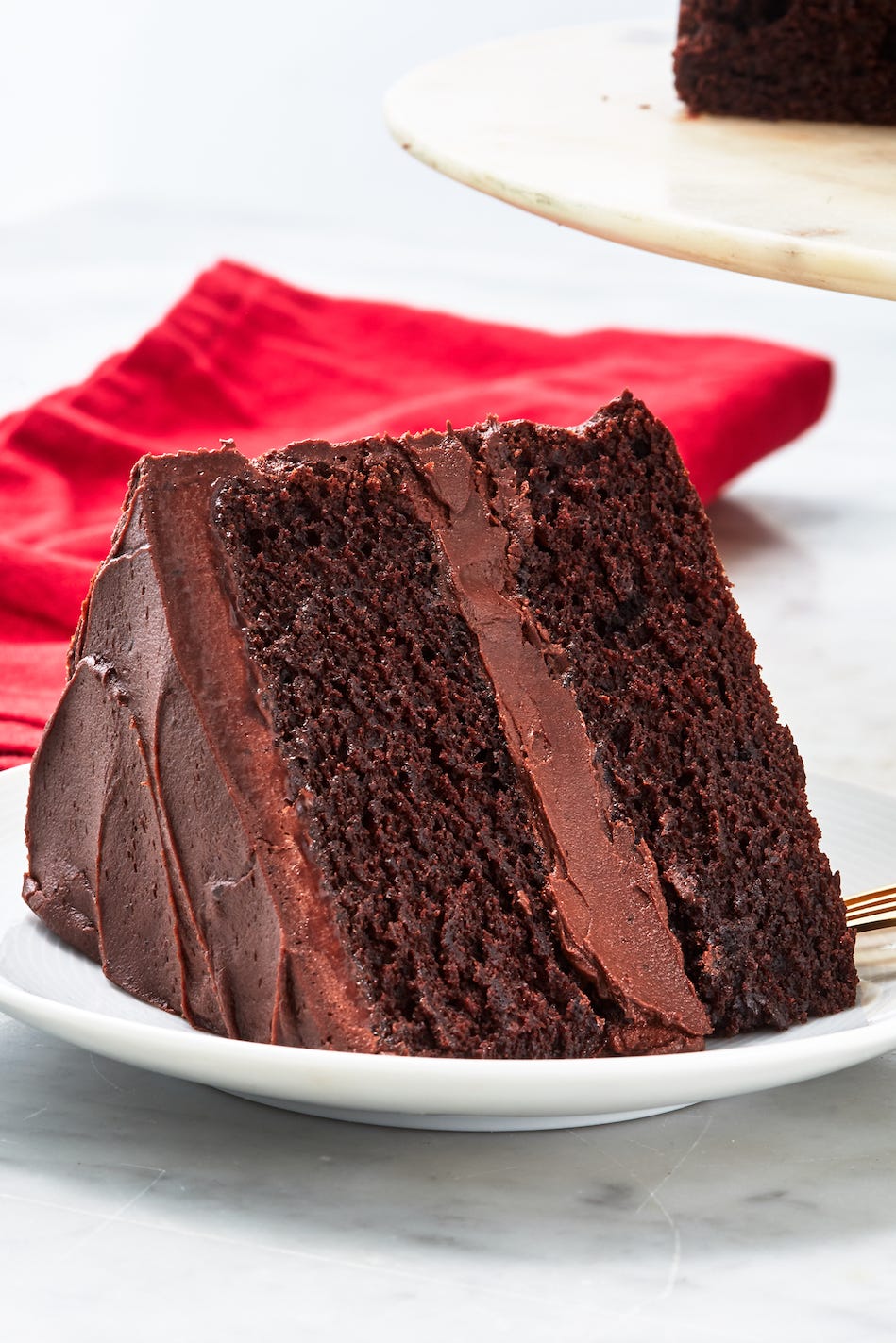 slice of vegan chocolate cake on a plate