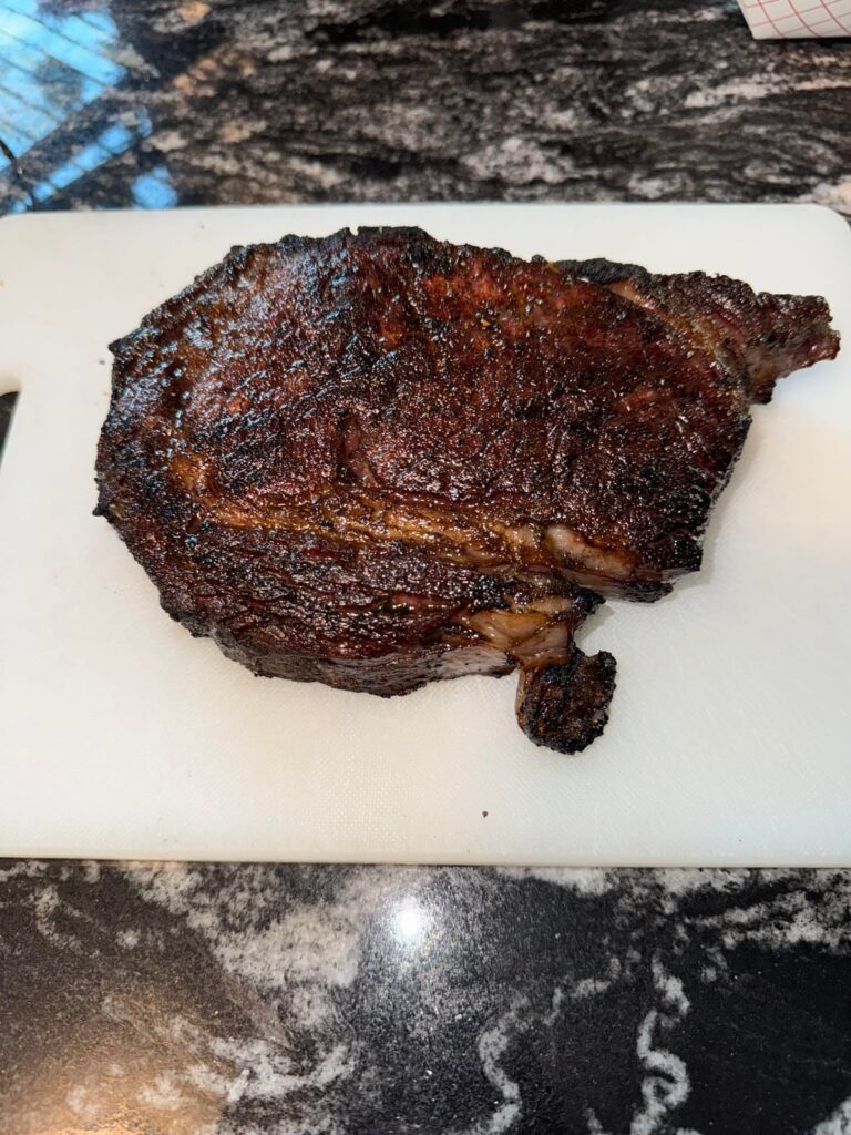 Dry age seared over coals