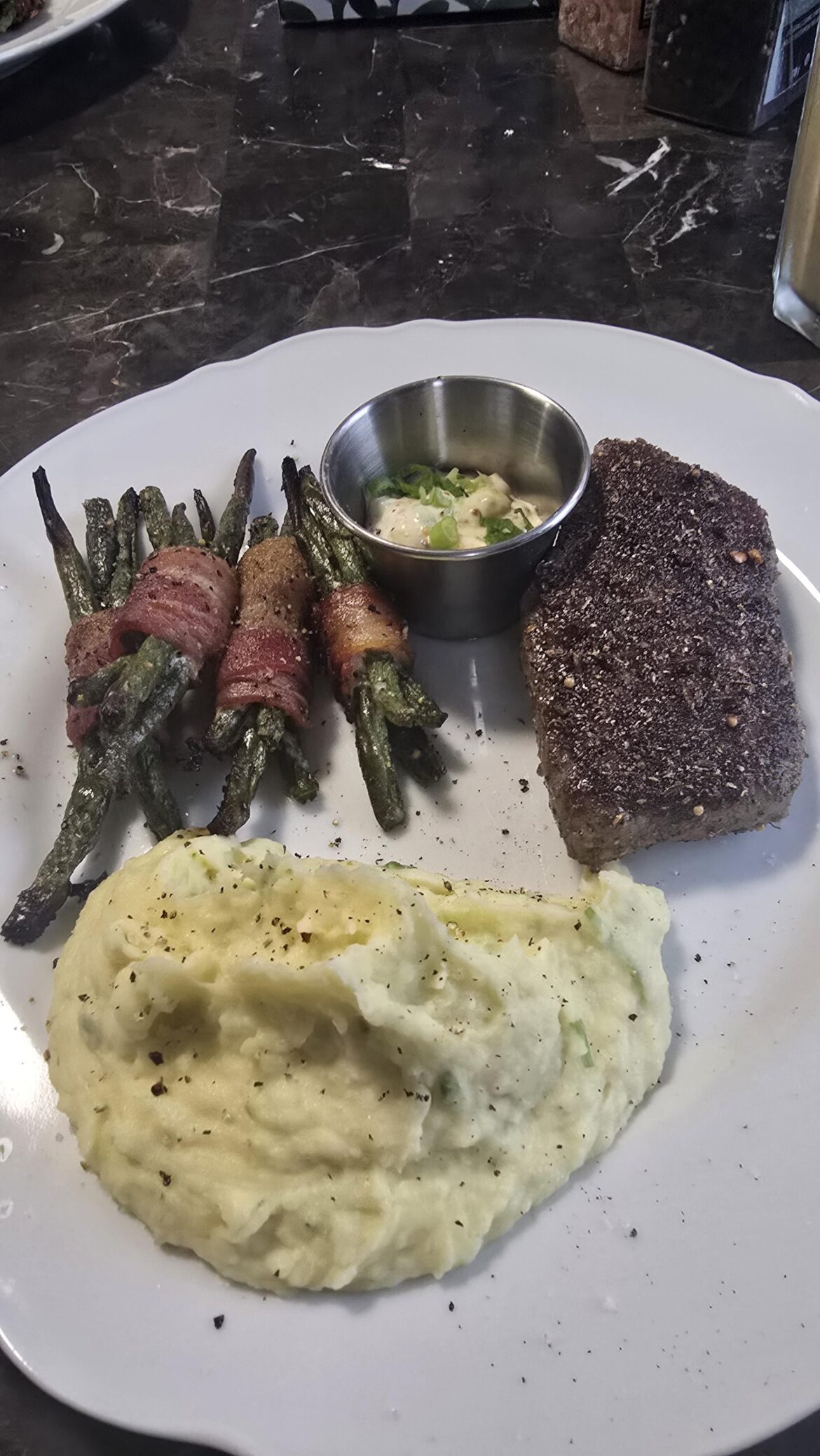 Steak and Bacon-Wrapped Green Beans with Garlic Mash and Horseradish Sauce