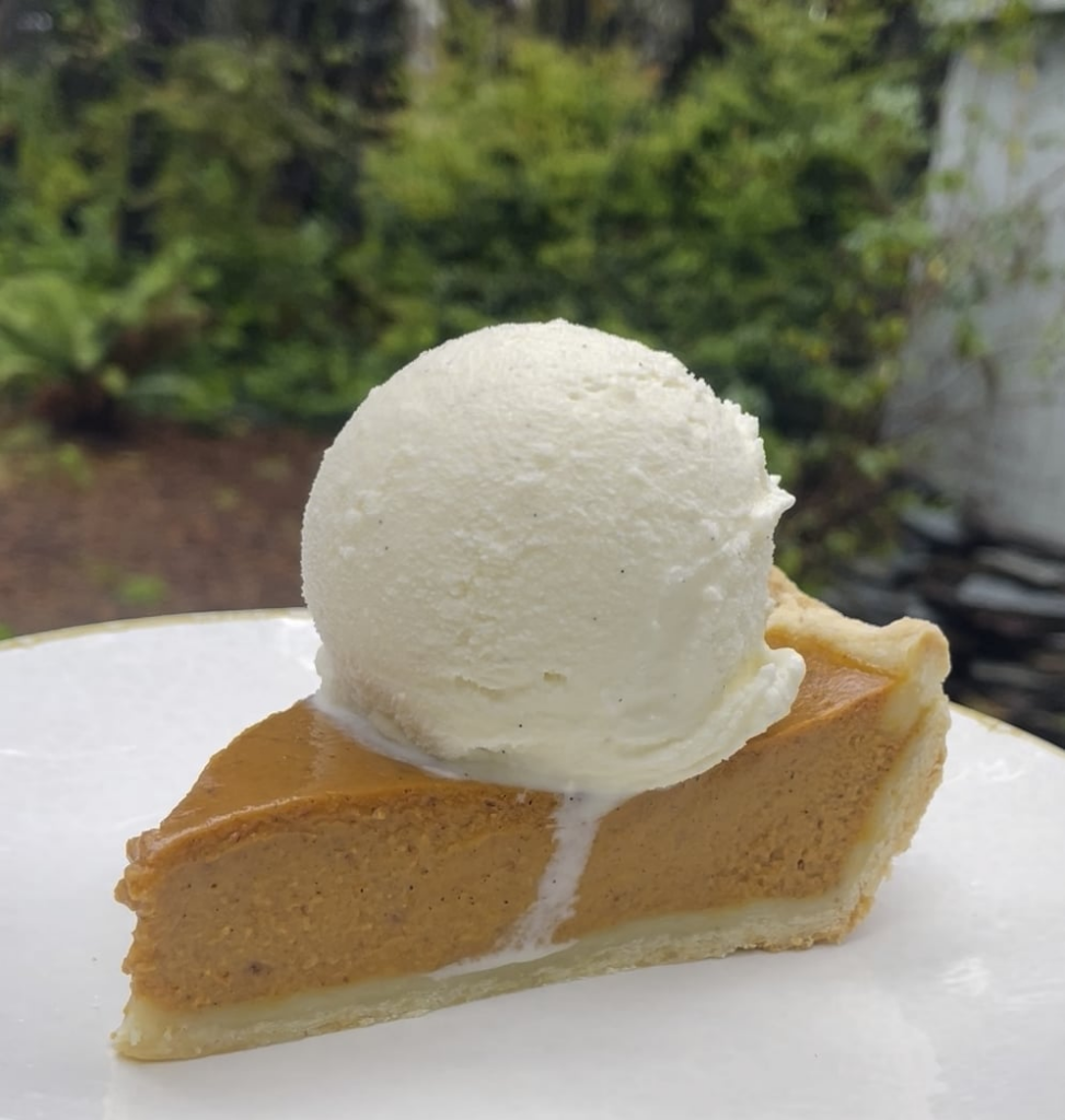 Enjoying a slice of pumpkin pie a la mode while listening to the rain.