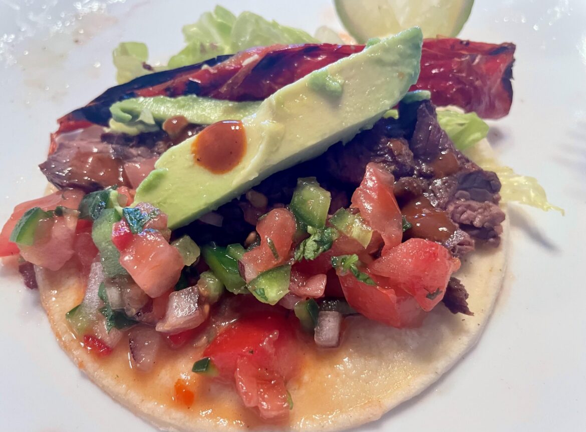 Street tacos for dinner tonight made with hanger steaks & homemade pico de gallo - topped with roasted peppers and avocado. 🥑