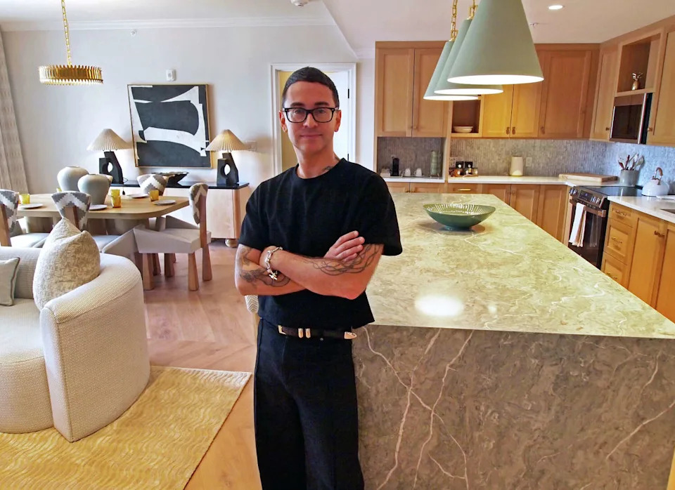 Fashion designer Christian Siriano poses in the suite he designed during a tour of the interior of the Delamar Westport in Westport, Conn., on Wednesday October 8, 2025. (Christian Abraham/Hearst Connecticut Media)