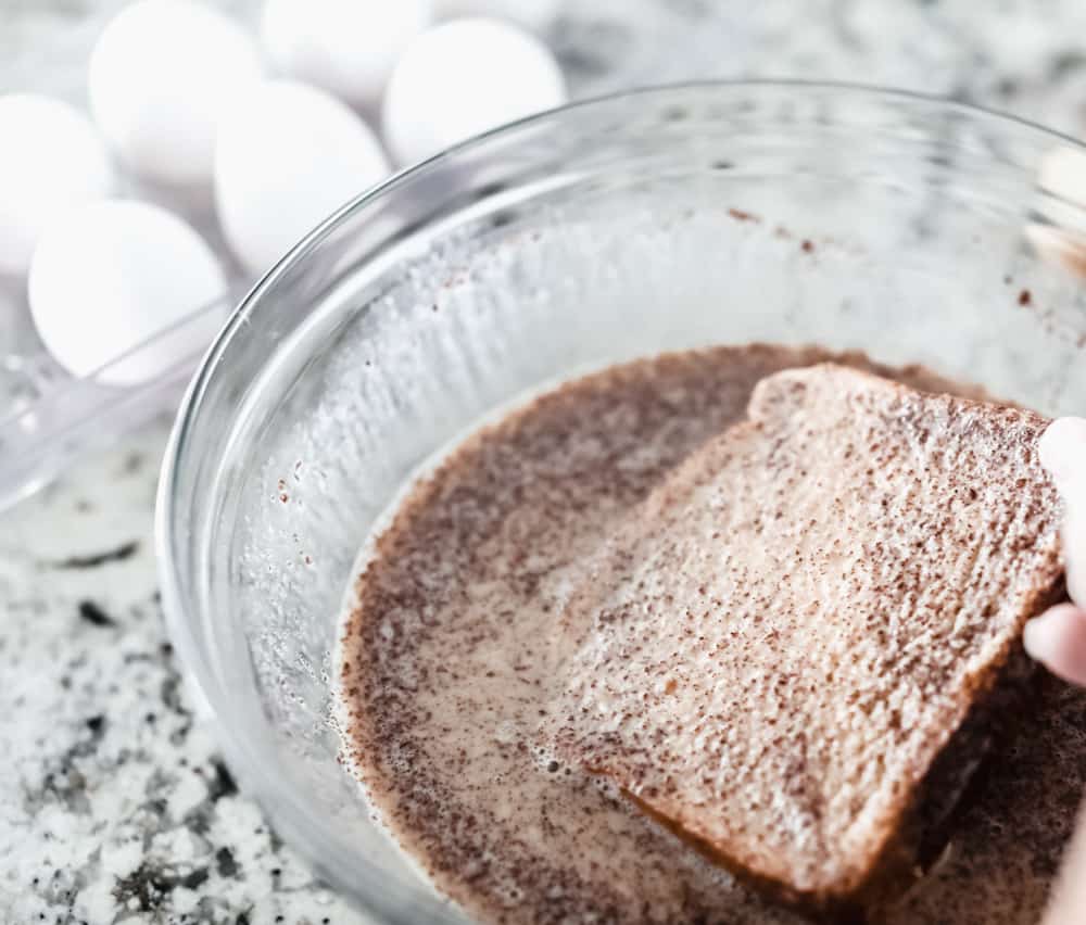 French Toast is a sliced thick, chunky bread dipped in a creamy egg, milk and cinnamon mixture with a secret ingredient that will take this French toast over the top! A little slice of heaven on your plate! Dipping your French toast in your egg mixture