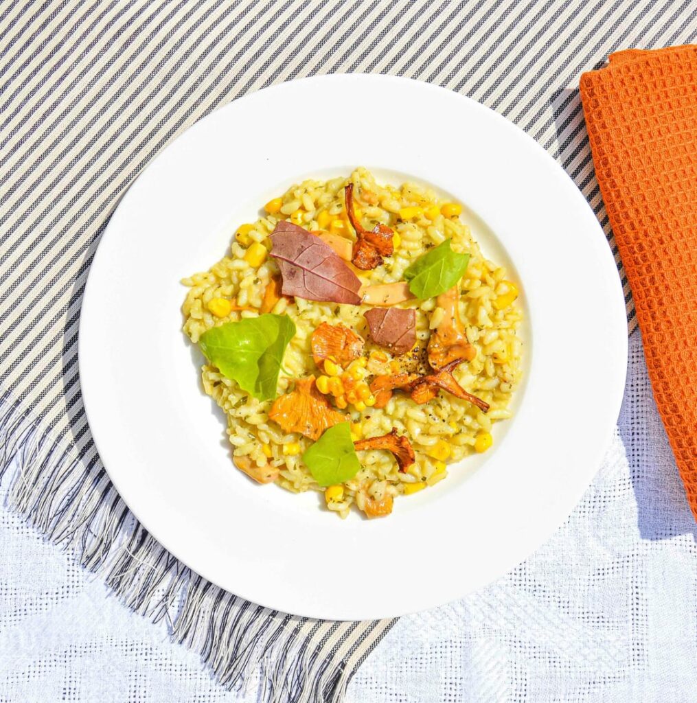 Chanterelle risotto with corn, fresh parsley, and Parmigiano Reggiano