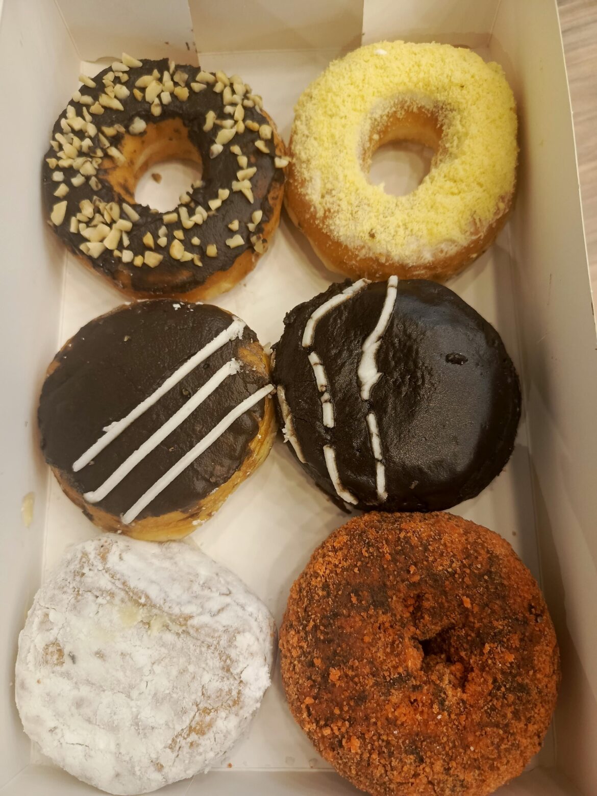 Got this random box of donuts trying to guess each flavor before biting in 😅 which one are you grabbing first?