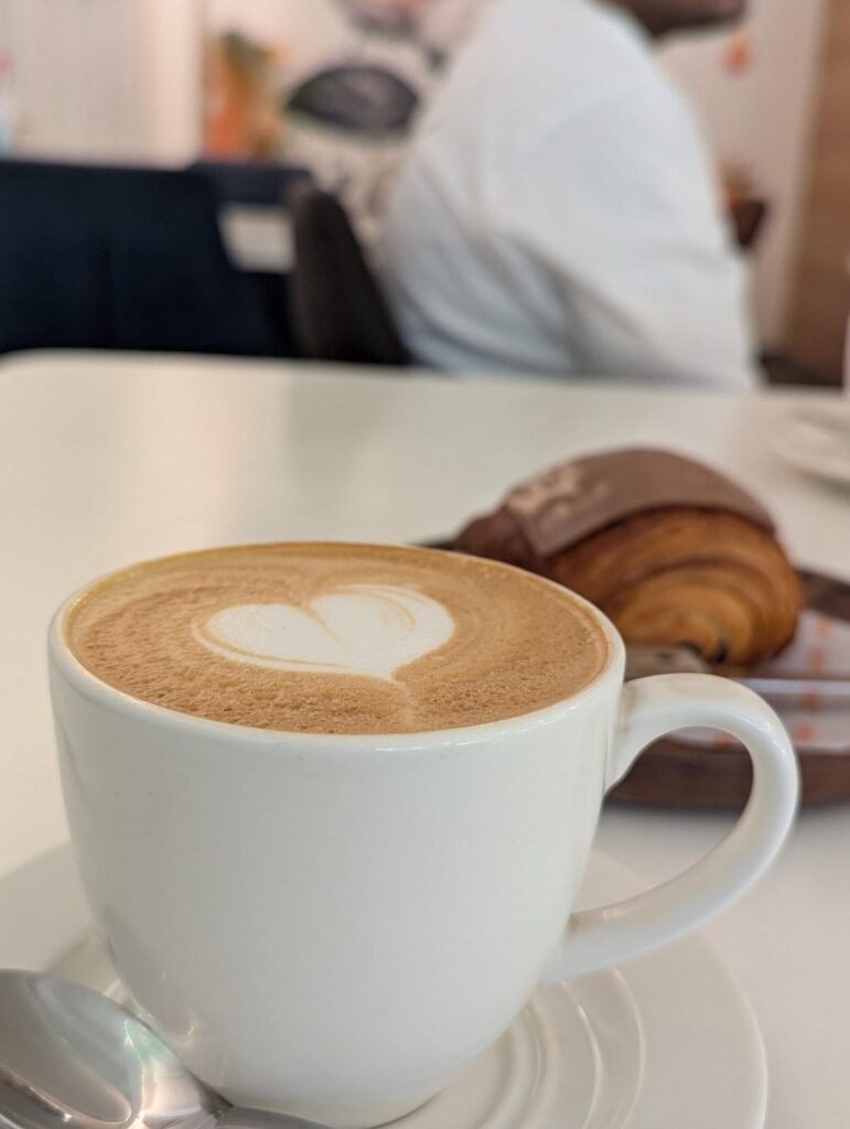 One of the best flat white ☕ along with pain au chocolat @krust cafe, Koramangala