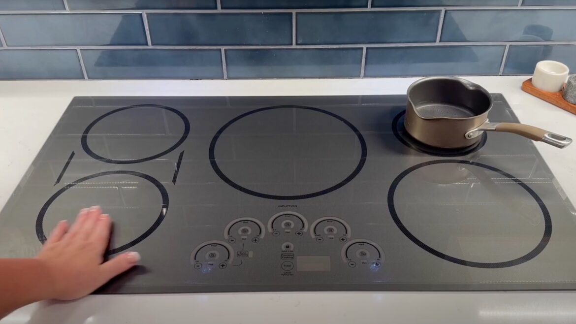 The model the chef showed has a stainless steel top with five burners.