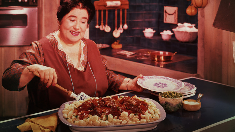Woman serving pasta