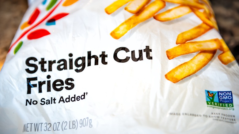 closeup of frozen straight cut french fries with no salt added package plastic bag by 365 Whole Foods market grocery supermarket store