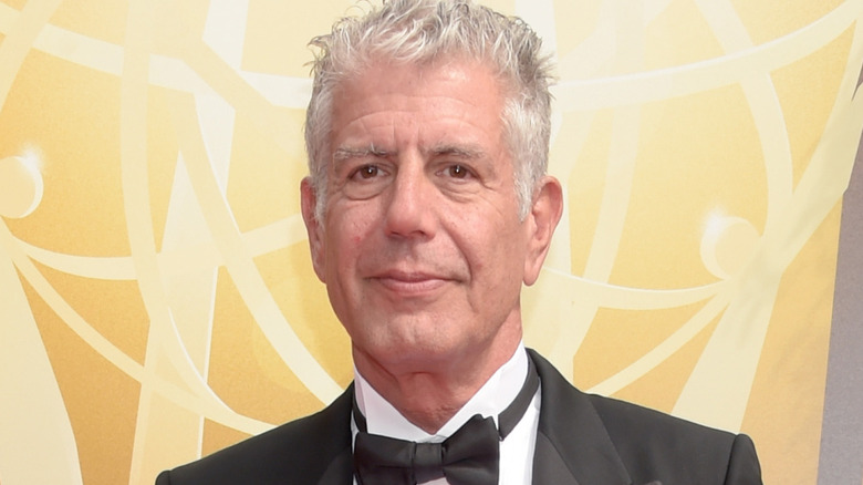 Anthony Bourdain smiling in tux
