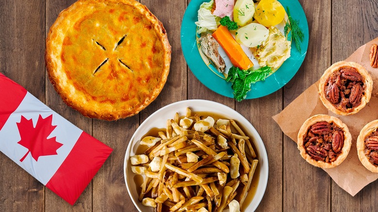 Composite image of various Canadian foods arranged on wooden planks with flag