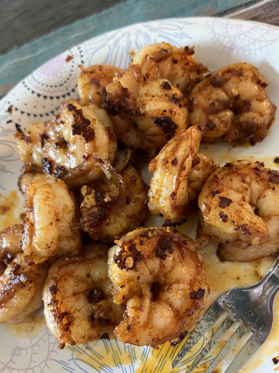 Shrimp cooked with salsa macha and garlic