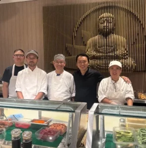 Chef Tam Ngo (second from the right) with the team at Kiku Monkland