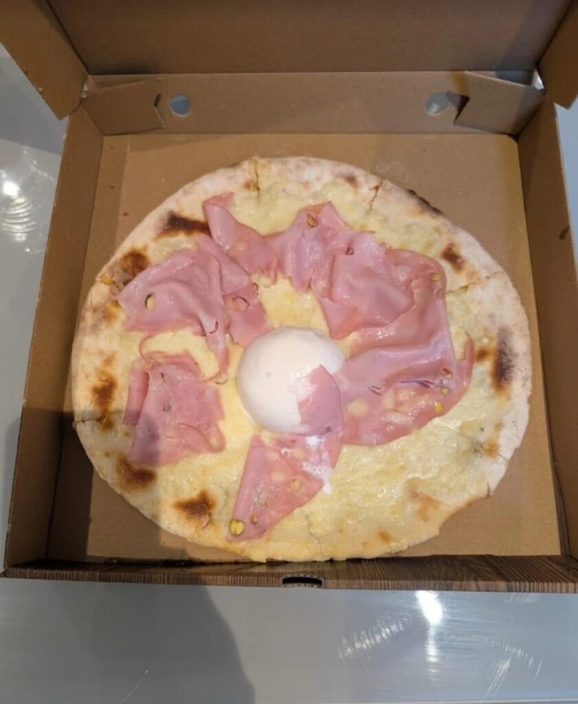 Was looking through reviews of a local pizza place and found this monstrosity