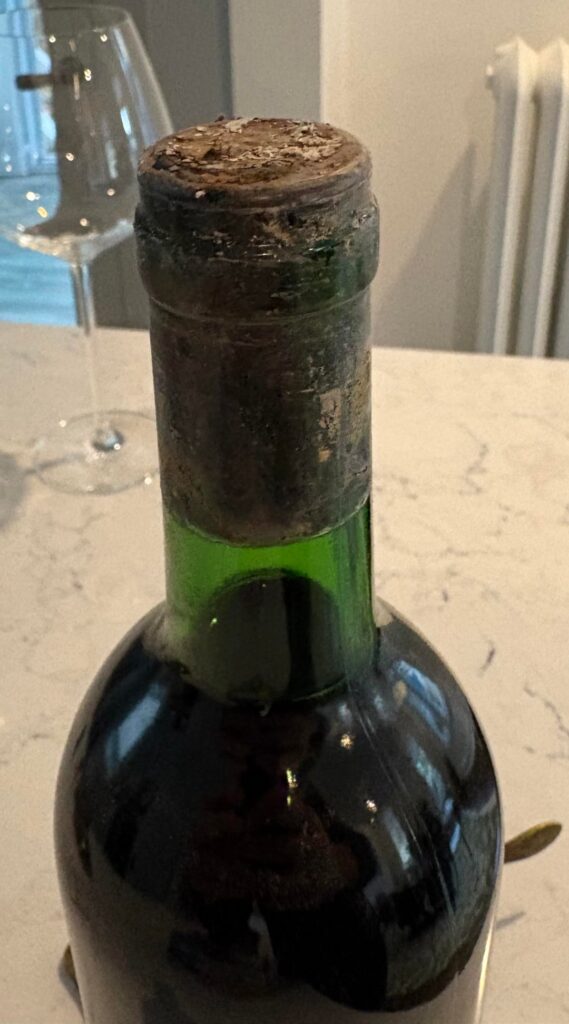 Mold under cap. Safe to drink?