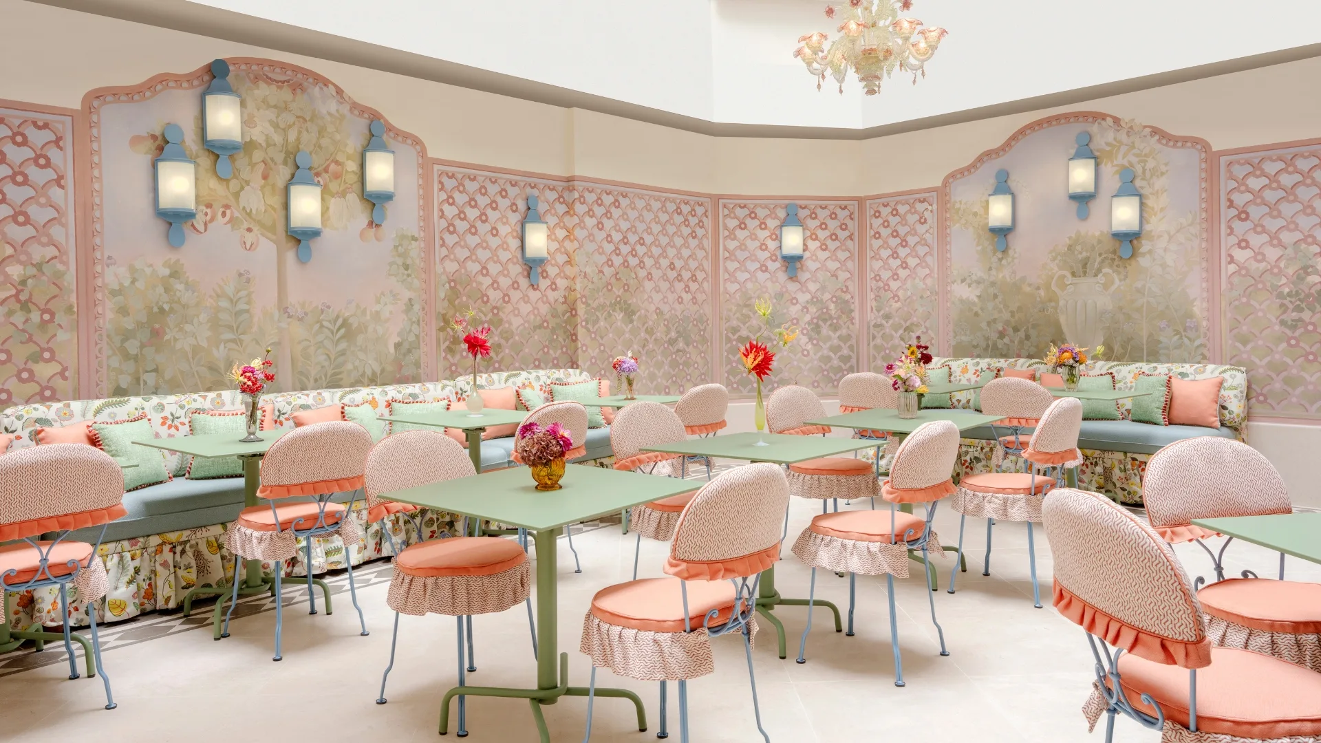 Pastel pink dining space in the Winter Garden at Le Grand Mazarin