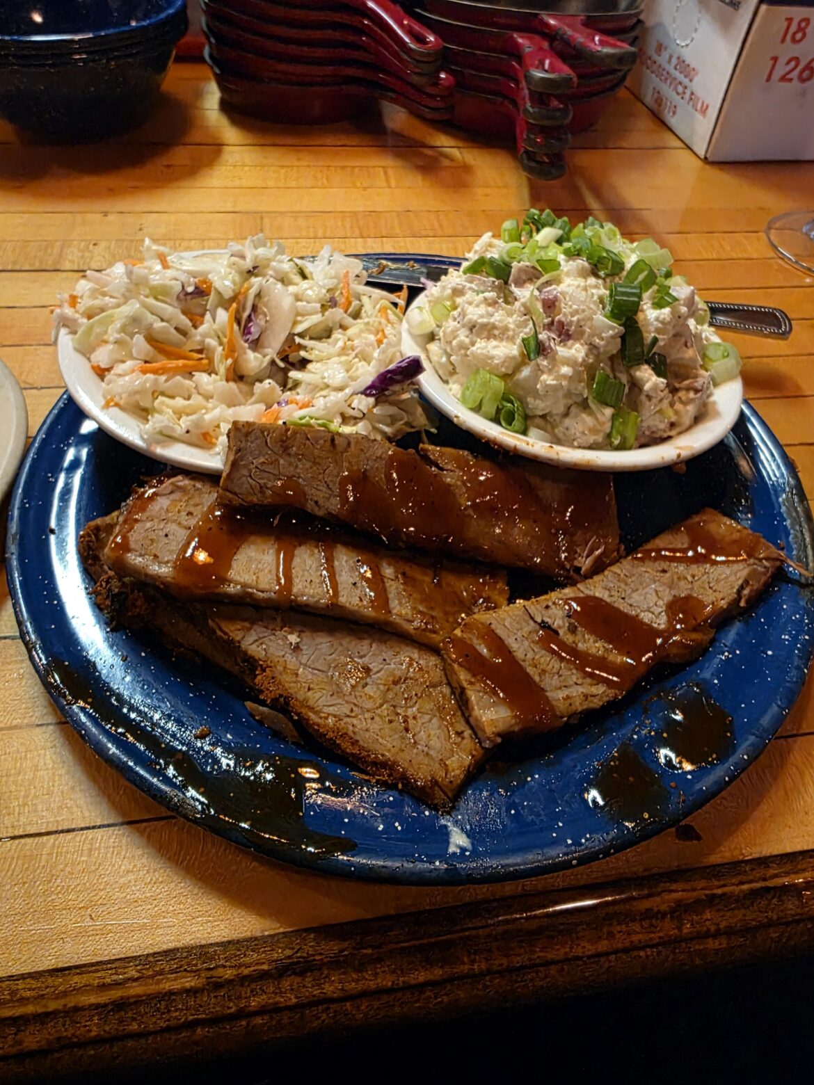 "Smoked" brisket I watched them reheat on the griddle