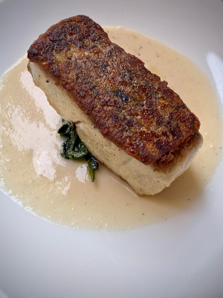 Confit sea bass, sauce vin blanc