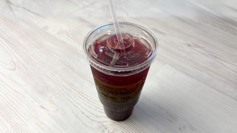 A plastic cup of Cracker Barrel merry berry tea