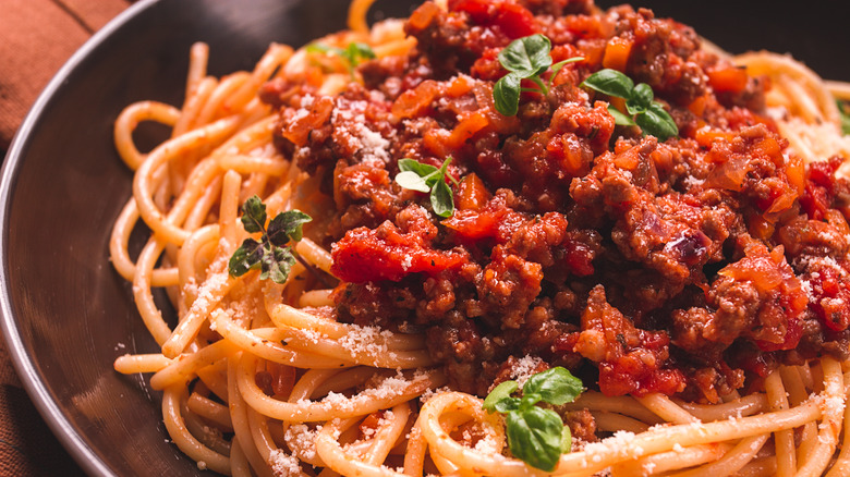 Close-up of spaghetti and meat sauce plated