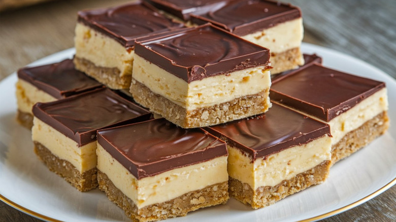 Stack of Nanaimo bars on a plate