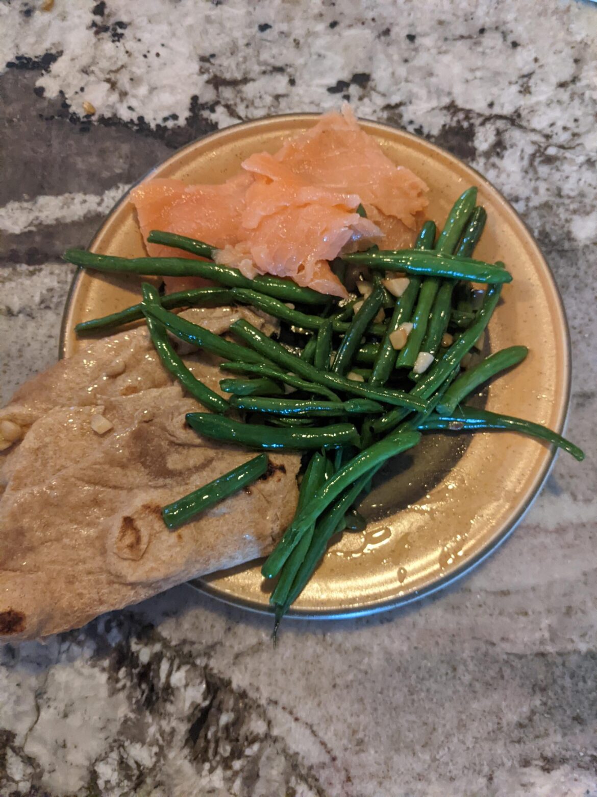 Smoked salmon, garlic green beans, whole wheat flat bread
