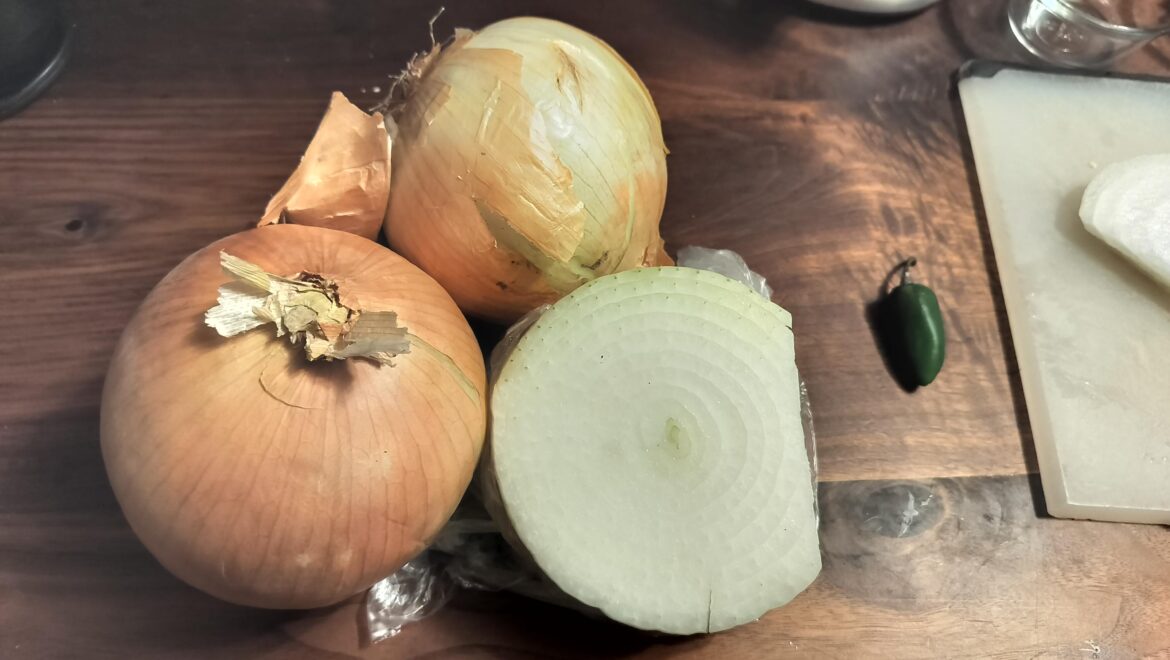 One of my husband's customers is an onion farmer. Jalapeno for scale, these are the size of small cantaloupes.
