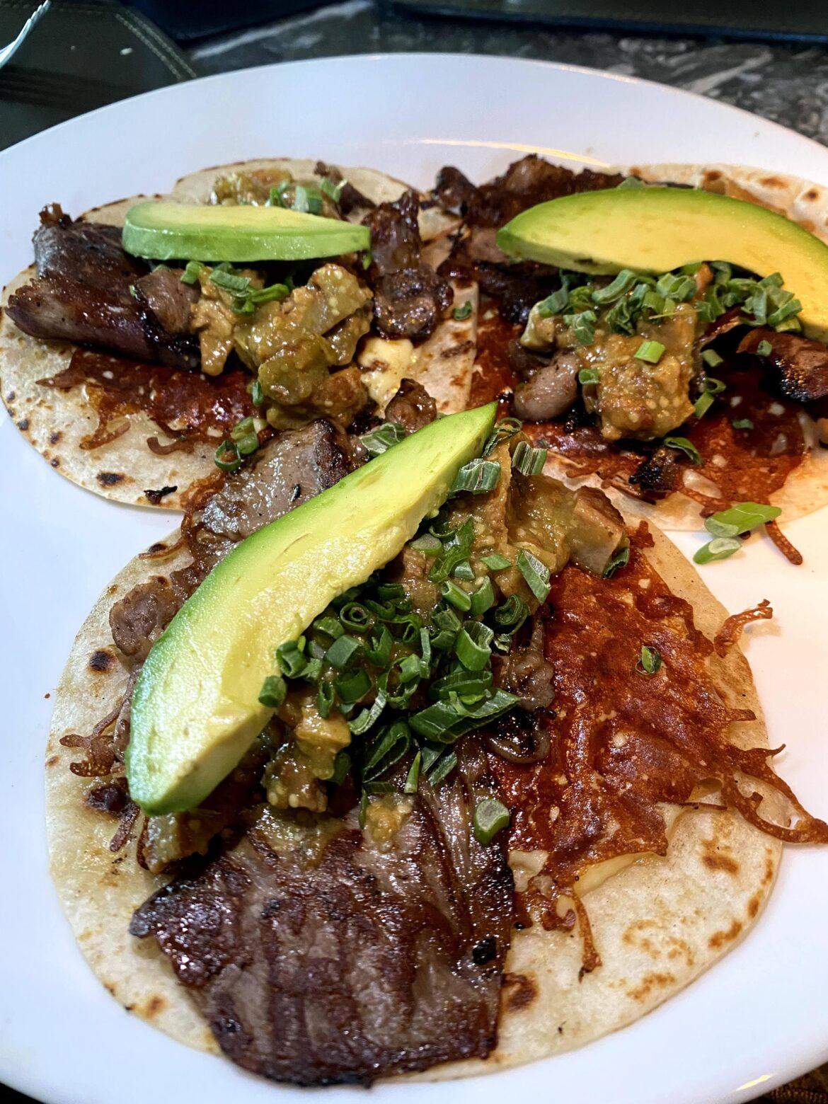 Ribeye Tacos with cheese and chicharron