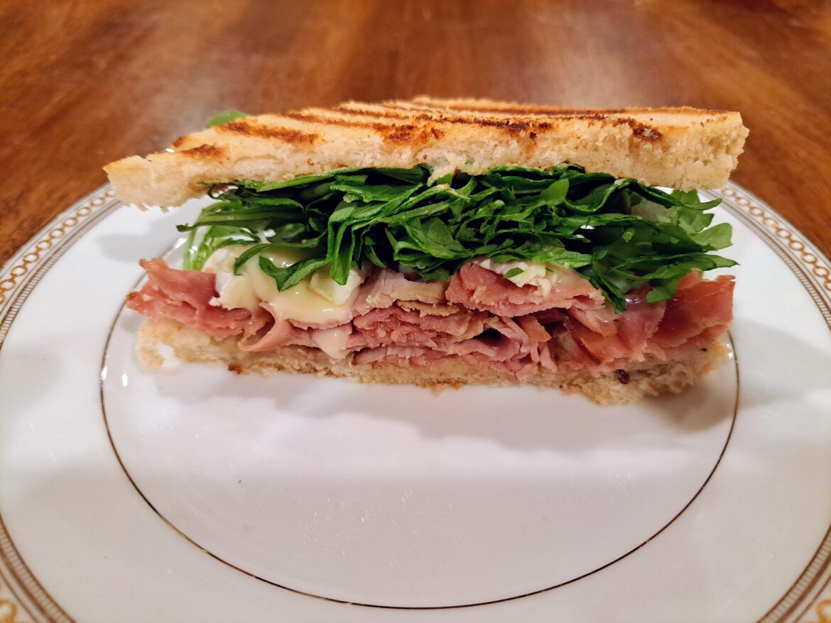 Uncured black forest ham, brie, baby arugula, and Dijon on toasted / grilled pane Italiano bread