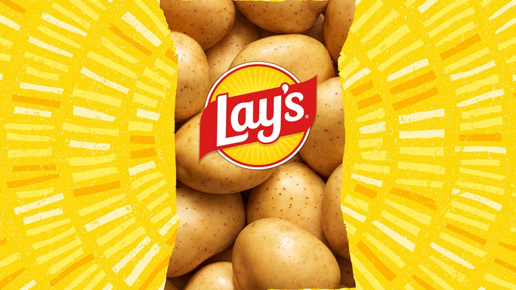 A pile of potatoes with the Lay's logo in the middle, framed by a yellow patterned border.