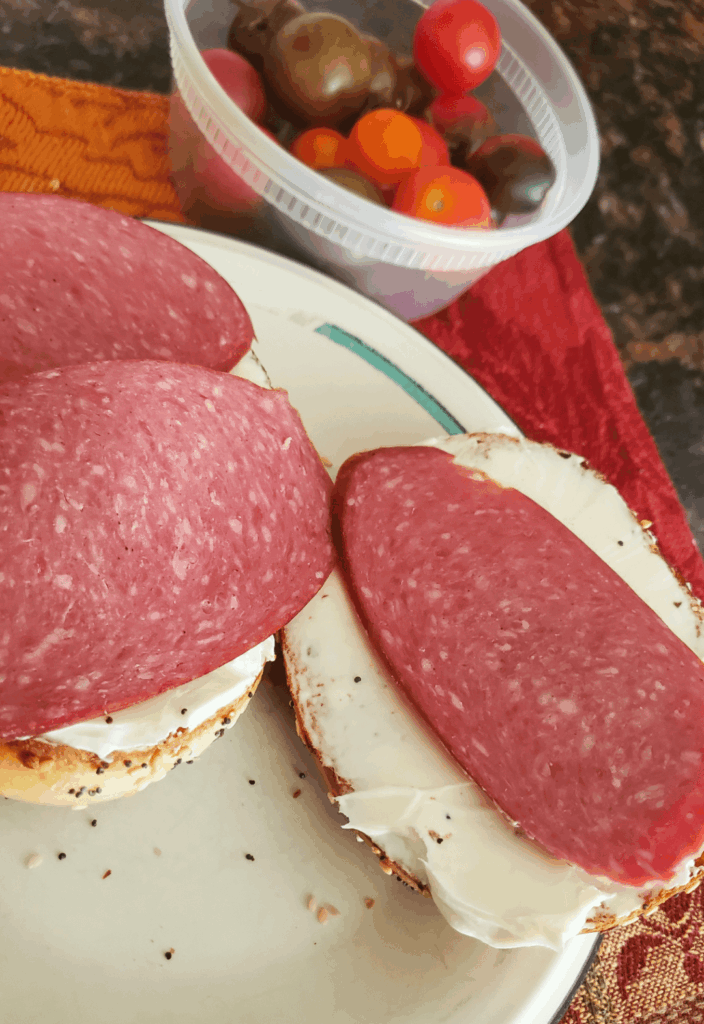 Everything bagel with labneh, beef salami, & cherry tomatoes