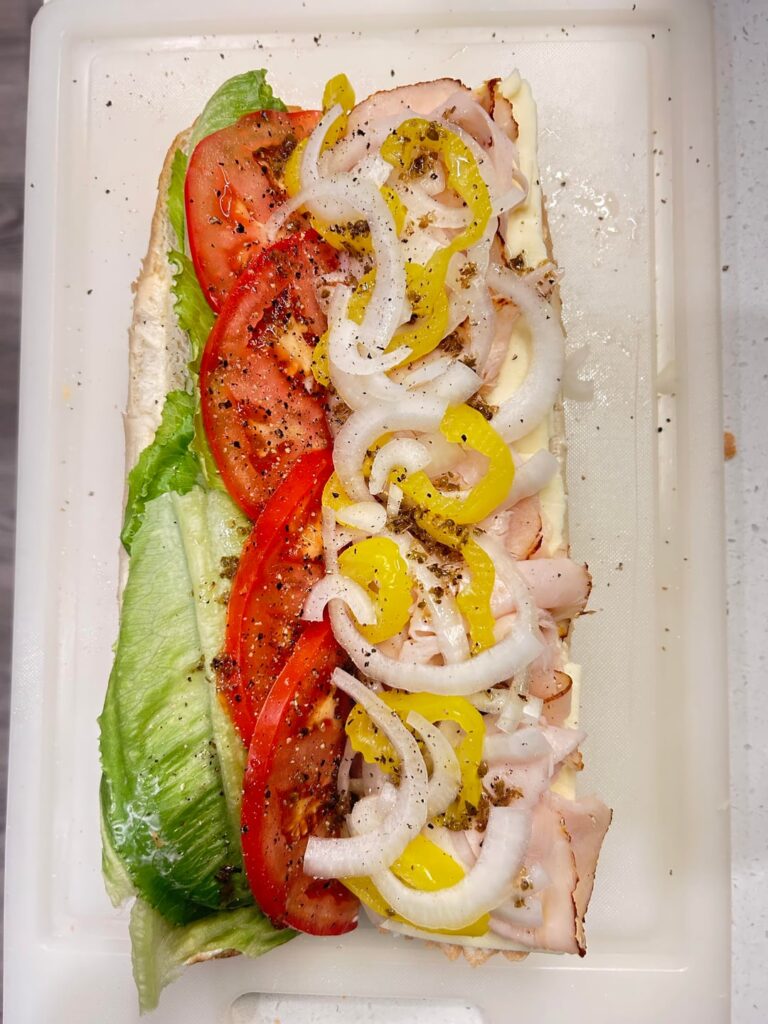 A masterpiece of a Turkey and Cheese 🤌