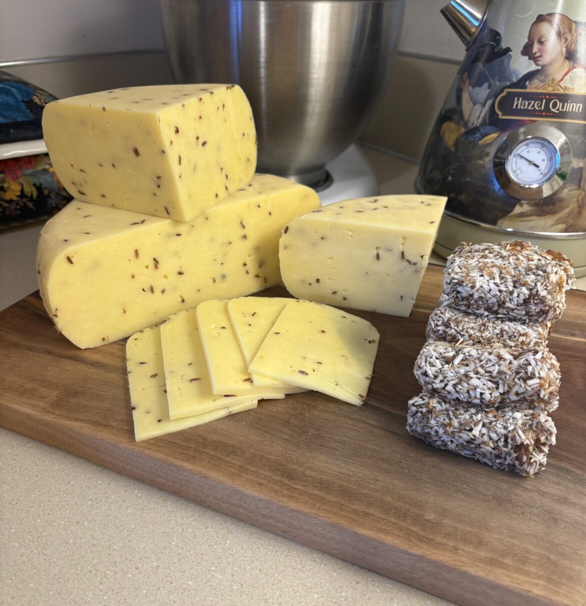 Homemade toasted caraway seed Colby cheese.    This cheese is absolutely delicious. Served it with some coconut date rolls.