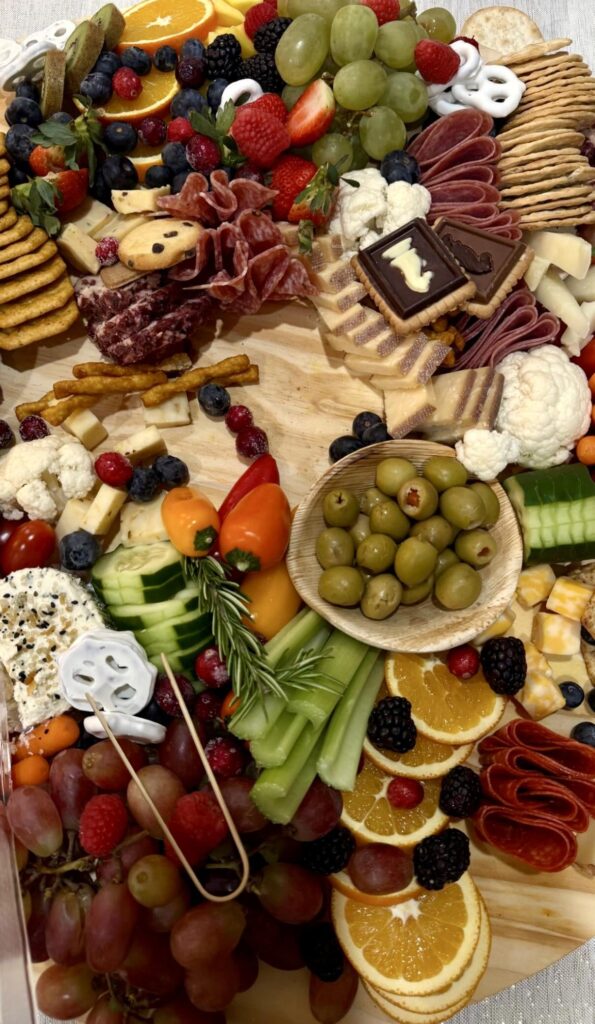 Since you guys loved the last Charcuterie board, I placed my own order! I got this one for me, my mom, and sister (we had to take a bite, sorry)