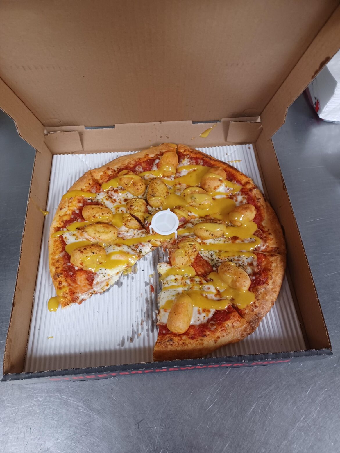 Corn dog pizza with honey mustard