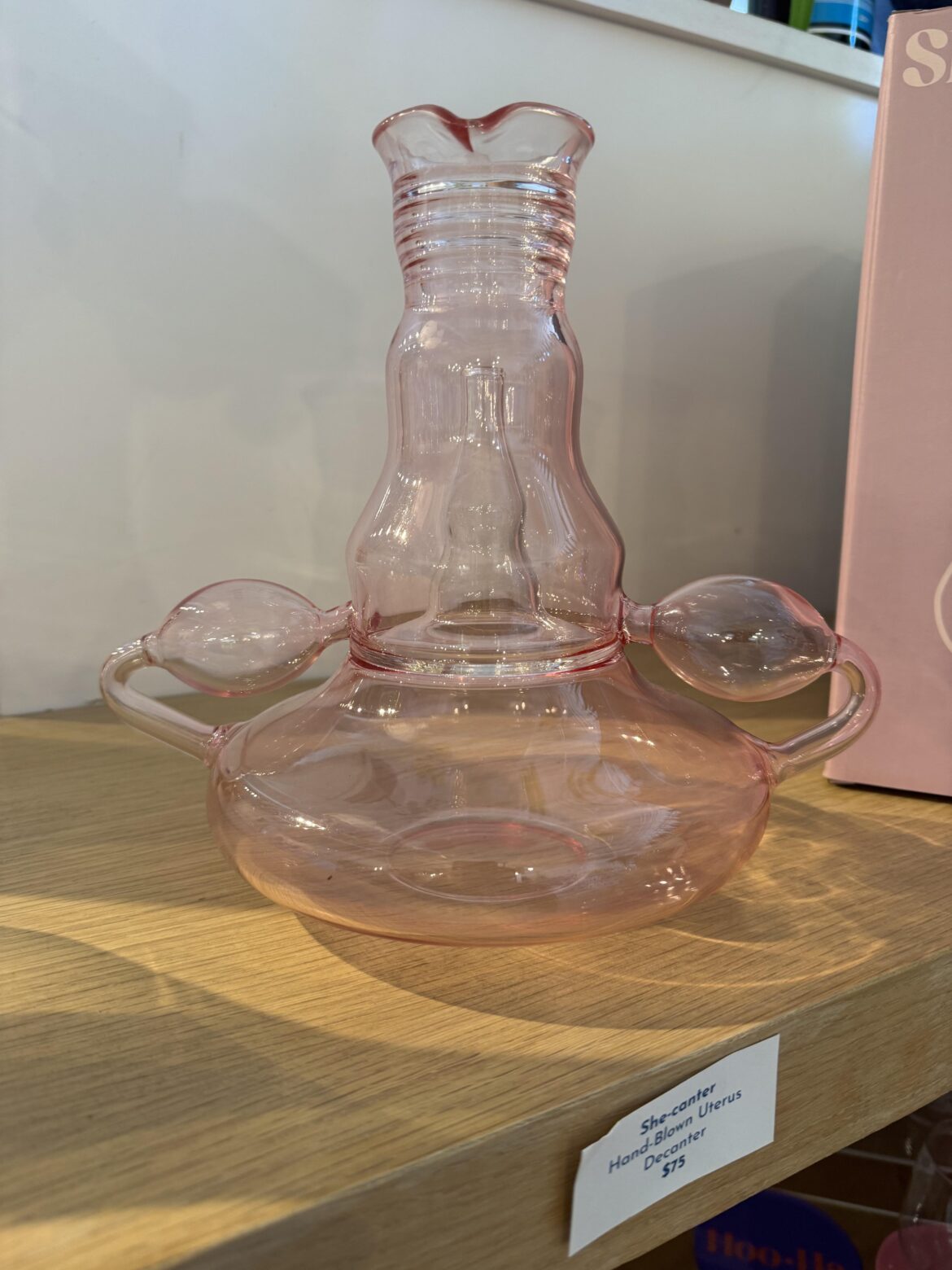 She-Canter a hand blown Uterus Decanter
