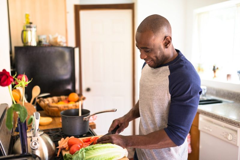 Person prepping dinner he is about to cook.