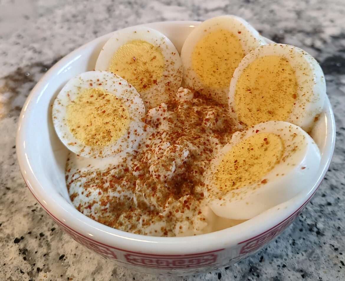 Simple lunch: cottage cheese, HB egg, hot pepper powder.