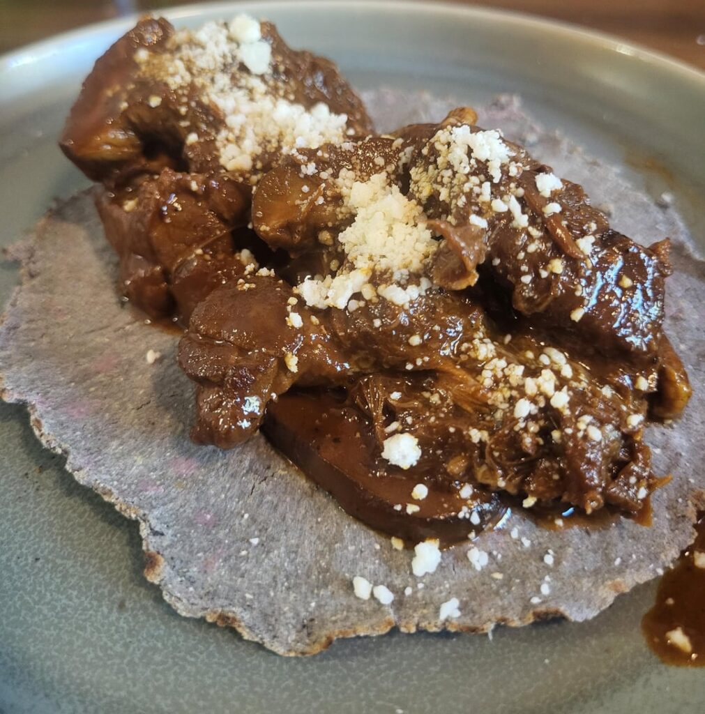 Pork Pasilla Tacos with mushrooms.