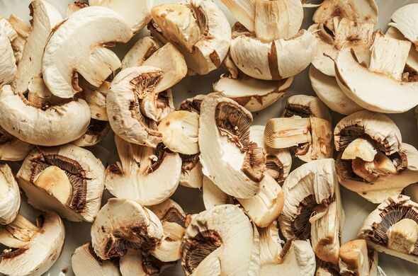 Sliced champignons mushrooms background Sliced champignons mushrooms background