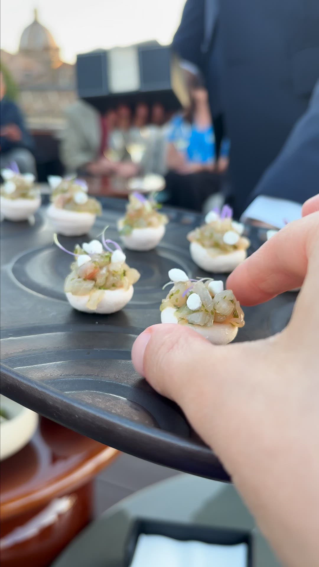 francesca zani at a salumeria on the left, plate of pasta on the right