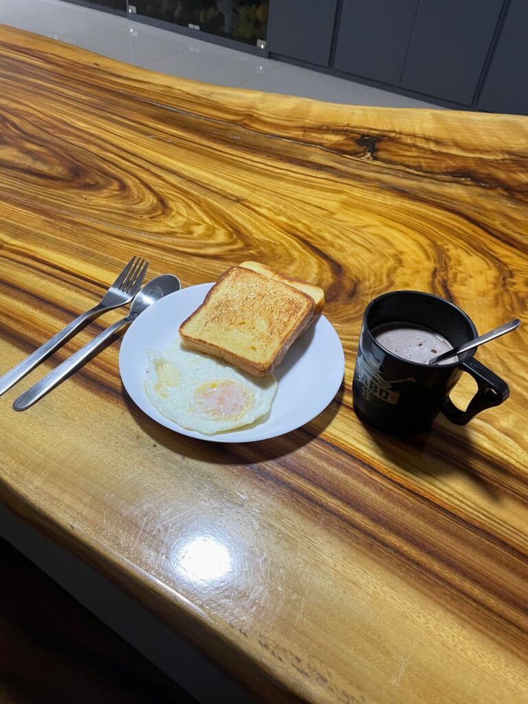 My sandwich- 2 pieces of toasted bread, one fried egg, and one cup of MILO
