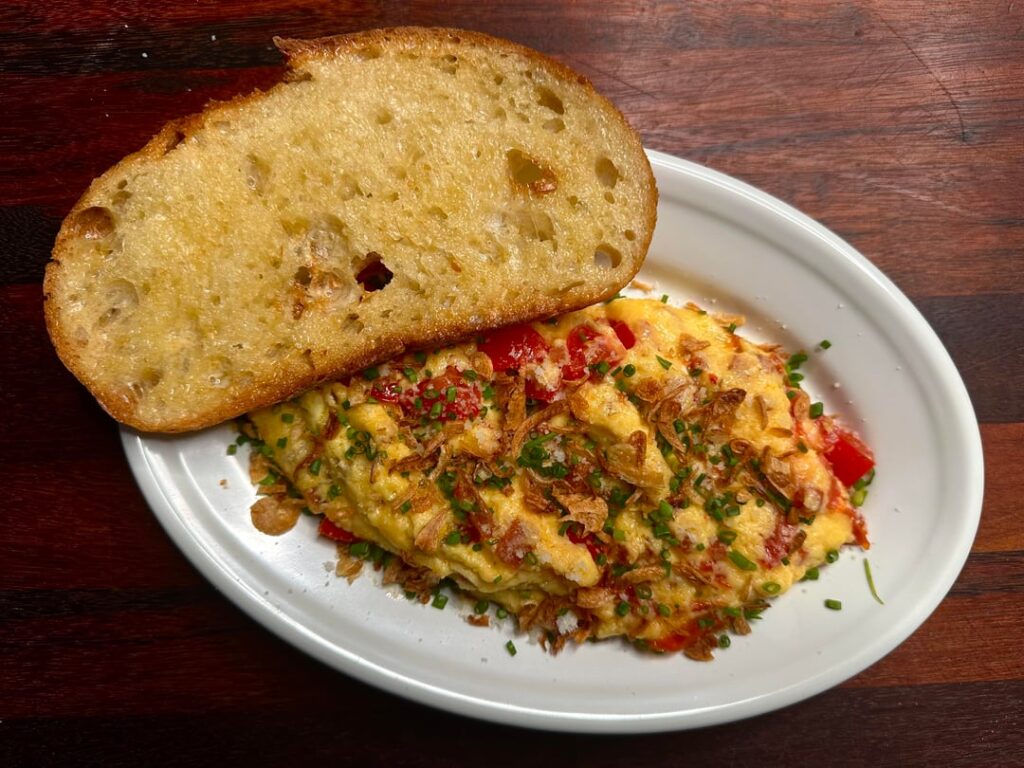 Cheesy scrambled egg with pepperoni