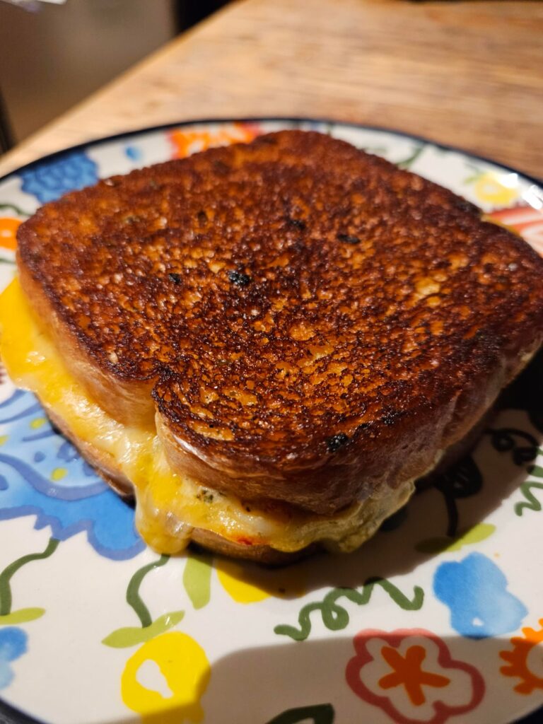 Goat cheese, muenster, and Sharp Cheddar