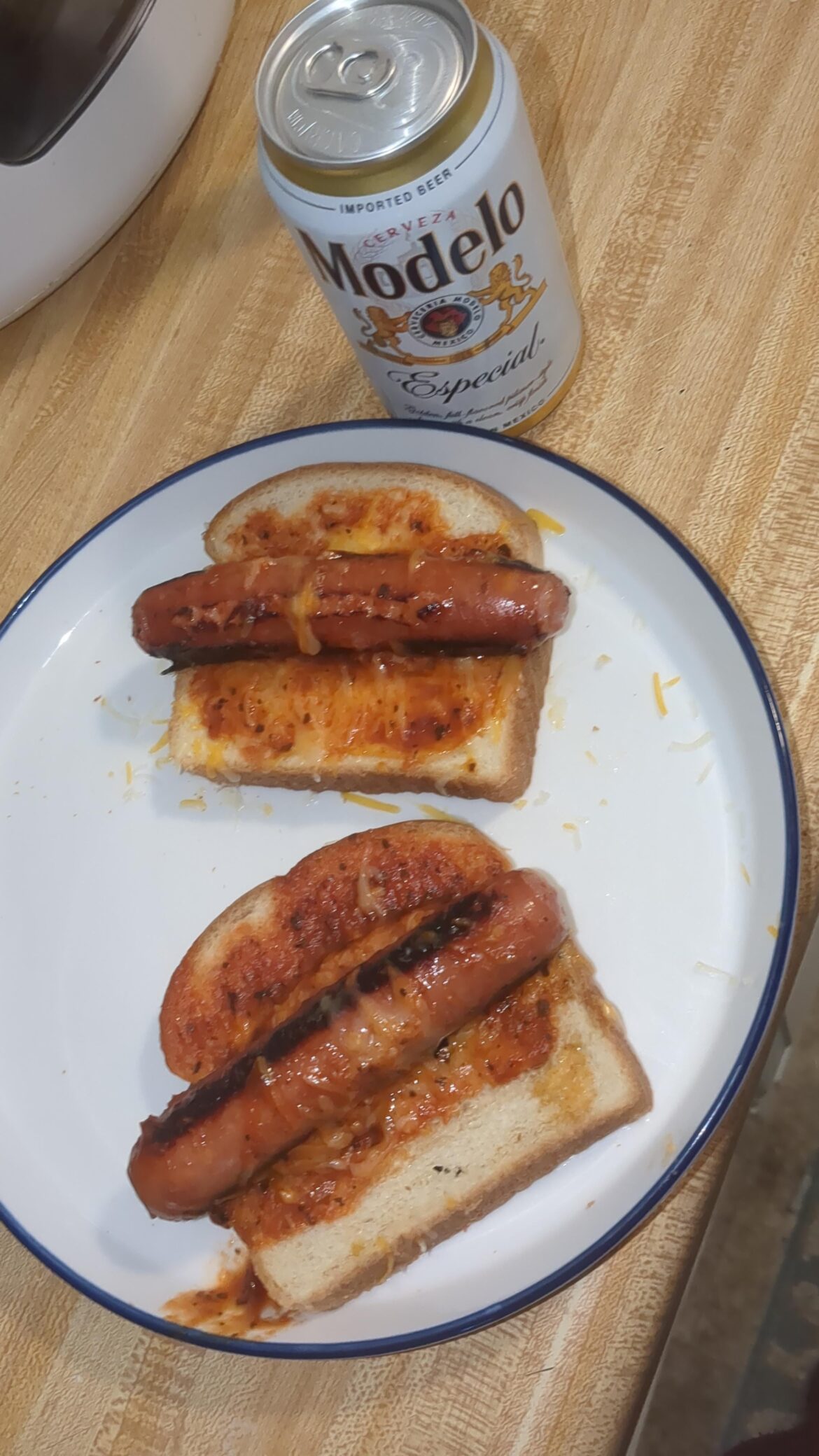 Johnsonville sausages with marinara and Colby jack after a long warehouse shift
