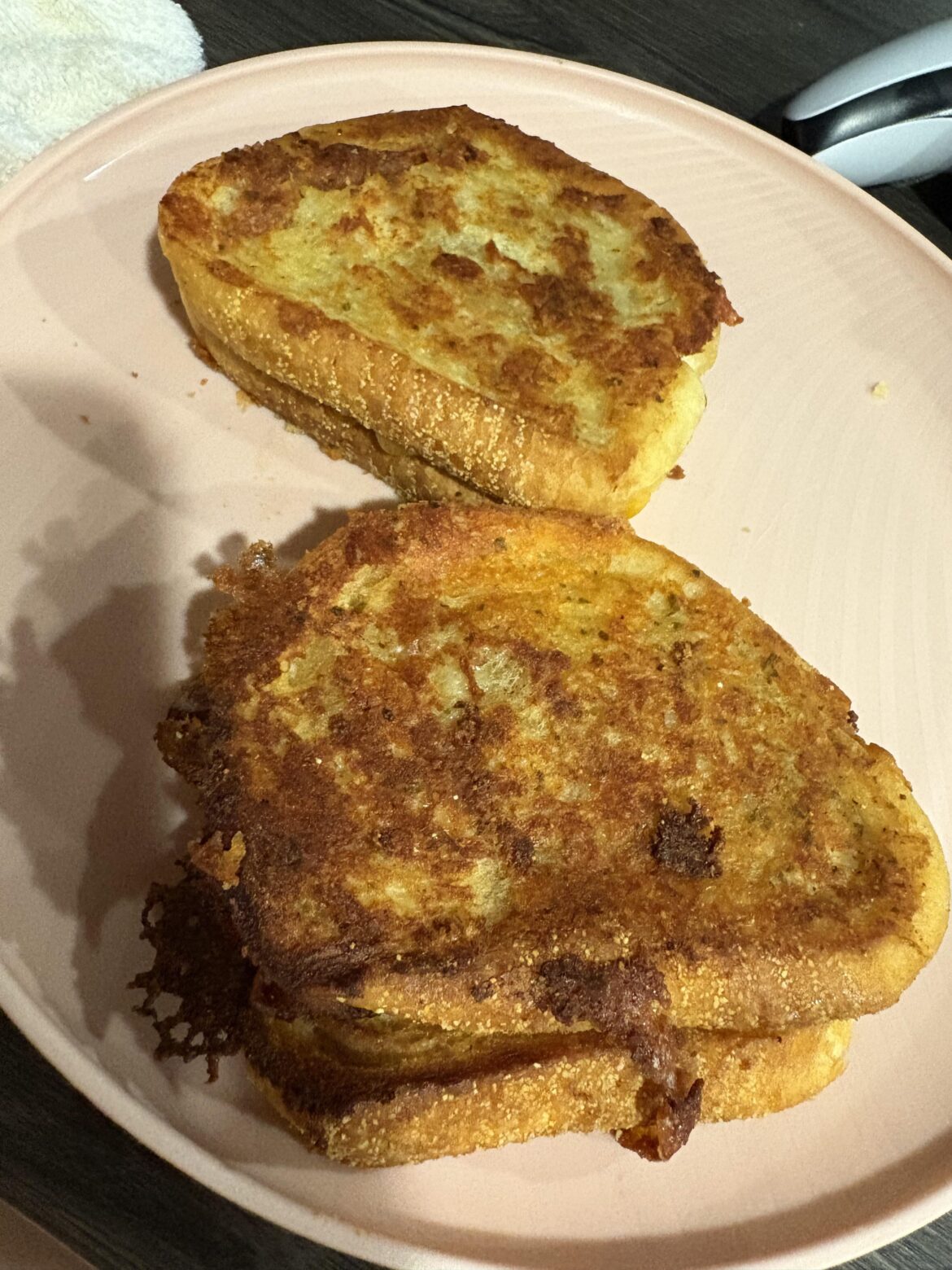 Texas toast grilled cheese with bacon, Gouda, cheddar, and Gruyère