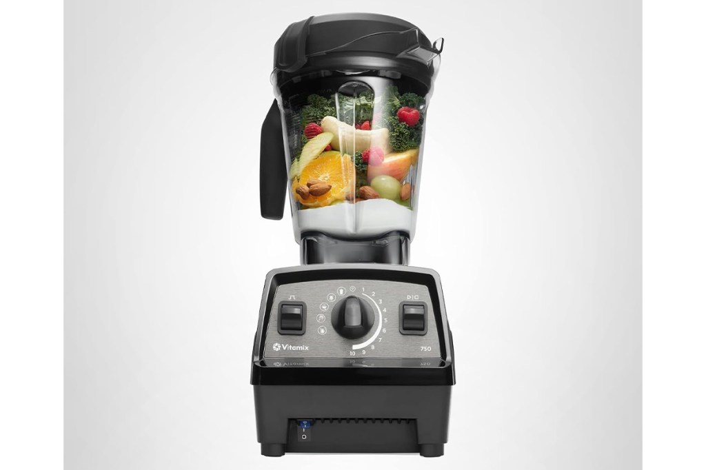Blender filled with fruit