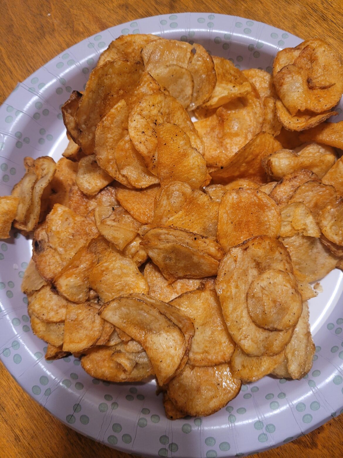 Update from the roommate who washed the chips and air fried them. Some taste like normal chips with no flavor at all and some are still wet and gross.
